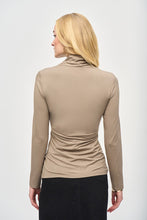 Load image into Gallery viewer, Indulge in understated glamour with this beautiful jersey knit top. The wrap neckline and long sleeves pair to perfection to add poise and a timeless elegance to this design. Delicate side shirring compliments the garment’s alluring fitted silhouette and creates a look that can seamlessly transition from day to night.