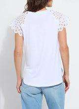 Load image into Gallery viewer, The Lyssé Katarina Eyelet Sleeve Trim Top is a refined yet effortless short-sleeve blouse featuring delicate eyelet-trimmed sleeves for a touch of elegance. Designed with a relaxed silhouette, this top offers both comfort and sophistication, making it a versatile addition to any wardrobe.