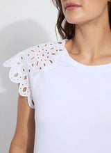 Load image into Gallery viewer, The Lyssé Katarina Eyelet Sleeve Trim Top is a refined yet effortless short-sleeve blouse featuring delicate eyelet-trimmed sleeves for a touch of elegance. Designed with a relaxed silhouette, this top offers both comfort and sophistication, making it a versatile addition to any wardrobe.