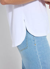 Load image into Gallery viewer, The Lyssé Katarina Eyelet Sleeve Trim Top is a refined yet effortless short-sleeve blouse featuring delicate eyelet-trimmed sleeves for a touch of elegance. Designed with a relaxed silhouette, this top offers both comfort and sophistication, making it a versatile addition to any wardrobe.
