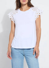 Load image into Gallery viewer, The Lyssé Katarina Eyelet Sleeve Trim Top is a refined yet effortless short-sleeve blouse featuring delicate eyelet-trimmed sleeves for a touch of elegance. Designed with a relaxed silhouette, this top offers both comfort and sophistication, making it a versatile addition to any wardrobe.