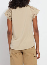 Load image into Gallery viewer, The Lyssé Katarina Eyelet Sleeve Trim Top is a refined yet effortless short-sleeve blouse featuring delicate eyelet-trimmed sleeves for a touch of elegance. Designed with a relaxed silhouette, this top offers both comfort and sophistication, making it a versatile addition to any wardrobe.
