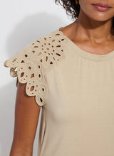 Load image into Gallery viewer, The Lyssé Katarina Eyelet Sleeve Trim Top is a refined yet effortless short-sleeve blouse featuring delicate eyelet-trimmed sleeves for a touch of elegance. Designed with a relaxed silhouette, this top offers both comfort and sophistication, making it a versatile addition to any wardrobe.