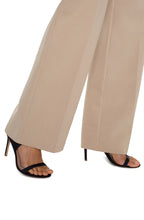 Load image into Gallery viewer, Our best-selling Kelsey Knit Trouser now comes in color biscuit tan with a wide leg silhouette! Dress these up with a fitted blazer or pair with sneakers and a tee for an elevated casual look!