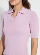 Load image into Gallery viewer, The Kenzie Ribbed Knit Polo in Rose Shadow is a stylish and versatile addition to your wardrobe. Crafted from Sculpting Rib Knit, this form-fitting sweater features a polo collar and short sleeves, making it perfect for both casual and semi-formal occasions. The rose shadow color adds a touch of elegance, while the stretchable fabric ensures comfort and a flattering fit. Ideal for those seeking a chic and modern look, our Kenzie pairs beautifully with jeans, skirts, or trousers.