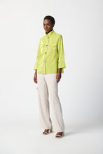 Load image into Gallery viewer, Stay stylish and dry in this water-resistant jacket featuring a fashionable funnel collar, front button closure, and functional pockets. Combining practicality with style, this brilliant color jacket is a must-have for any wardrobe, sure to catch attention with its striking design. Color - Key lime. Novelty fabric. Funnel collar. Cuff sleeves. Pockets and front button closure. Lined.