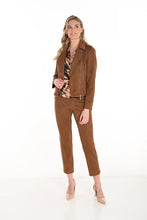 Load image into Gallery viewer, Woman wearing a camel-colored jacket over a printed brown top, camel-colored pants and beige heels against a white background.