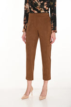 Load image into Gallery viewer, Model wearing camel-colored brushed knit pants, print brown top and beige heels against a white background.