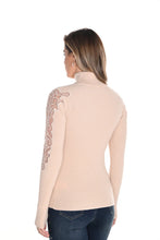Load image into Gallery viewer, Enhance your wardrobe with the sophisticated Brixley knit sweater. This beige turtleneck features exquisite lace detailing on the arms, elevating its style. Combining comfort and charm, the Brixley is ideal for layering or standalone wear. Its neutral hue adds versatility to any outfit.