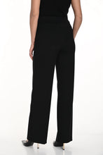 Load image into Gallery viewer, This exquisite pant is a sophisticated blend of beautiful fabrication, style, and utility. Designed to instill confidence and offer comfort throughout the day, the fabric is luxuriously soft, providing both stretch for comfort and a sleek silhouette. Additionally, the leather-trimmed non-functional front pockets further enhance the garment's aesthetic appeal.