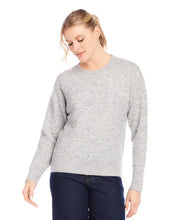 Load image into Gallery viewer, Experience warmth and elegance this winter with our light heather gray pearl crewneck sweater. Adorned with pearl details on the front and arms, this cozy and chic garment is suitable for any event. From formal occasions to casual outings, this sweater is sure to receive admiration.