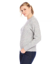 Load image into Gallery viewer, Experience warmth and elegance this winter with our light heather gray pearl crewneck sweater. Adorned with pearl details on the front and arms, this cozy and chic garment is suitable for any event. From formal occasions to casual outings, this sweater is sure to receive admiration.