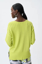 Load image into Gallery viewer, All eyes are on this striking lime green top designed by Joseph Ribkoff. Made from a lightweight summer sweater knit, our Lydia top offers a touchable texture that is super soft against the skin. A v split on each side is enhanced with silver rivet accents, while the V-neck design allows you to show off your favorite jewelry pieces. Color - Lime 3/4 Sleeve. Lightweight sweater knit.