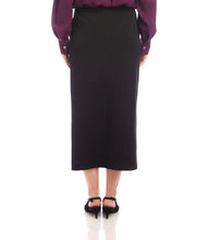 Load image into Gallery viewer, Model wearing a long black skirt, purple blouse and black heels against a white background.