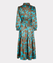 Load image into Gallery viewer, This Liva Long Expressive Roots Dress by EsQualo offers a flattering fit with sophisticated details. The unique "Expressive Roots" print provides a sophisticated style for dressy and casual occasions. Elevate your look with complementary jewelry or complete the ensemble with a denim jacket. This dress is sure to become a treasured addition to your wardrobe. Color- Peacock blue and brown. Long sleeve. Collared. Button down. Tie waist.