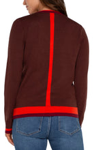 Load image into Gallery viewer, This long-sleeve sweater is the epitome of style, merging modern design with classic comfort seamlessly. It showcases striking color-block accents on the sleeves, neckline, back, and lower hem, lending a modern edge to the traditional shape. Made from a soft, cozy knit material, it's fashioned to provide warmth and fashion-forward appeal throughout the season.