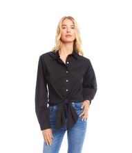 Load image into Gallery viewer, Woman wearing a long sleeve black shirt with a tie waist and blue jeans against a white background.