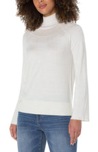 Load image into Gallery viewer, This timeless sweater is a classic blend of style and comfort. Crafted from a luxurious fabric in a porcelain white, with intricate pointelle stitching, it features a funnel neck and bell sleeves. Perfect for layering or wearing solo, it's a wardrobe essential. Color- Porcelain. Sweater yarn fabrication. Mock neckline. Bell sleeves. Pointelle detailing. Pullover construction.