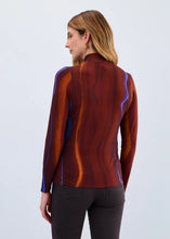 Load image into Gallery viewer, Woman wearing a multicolor long-sleeve top and black pants against a white background.