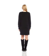 Load image into Gallery viewer, Woman wearing a black dress and black knee-high boots against a white background.