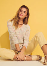 Load image into Gallery viewer, Soft and feminine, this ruched sweetheart neckline top offers a flattering, elegant fit that effortlessly transitions from day to night. The confetti design adds a touch of playful elegance, perfect for both casual outings and more formal occasions. With its long sleeves and comfortable fit, this style is a must-have for your seasonal collection.