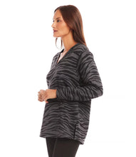 Load image into Gallery viewer, Experience ultimate comfort and warmth in our cozy zebra print long sleeve v-neck sweatshirt. Perfect for both leisurely days and cooler weather, this top pairs effortlessly with leggings or denim for a casual yet stylish look.