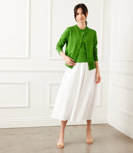Load image into Gallery viewer, Wrap yourself in soft sophistication with the Karen Kane Long Sleeve Cardigan Sweater in Green. Designed for comfort and versatility, this lightweight knit cardigan features a relaxed fit and long sleeves, making it the perfect layering piece for any season. Ideal for casual outings, workdays, or evening wear, this versatile cardigan pairs beautifully with dresses, jeans, or tailored pants.