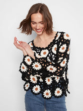 Load image into Gallery viewer, Woman wearing a black floral crochet top against a white background.