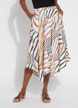 Load image into Gallery viewer, Expertly designed with a handkerchief point detail and wide bottom facing, the Lorenza Midi Handkerchief Skirt exudes chicness and fluidity. Crafted from Lightweight Satin and partially lined with Georgette, it pairs gracefully with the Evie Scoop Neck Tank and sandals.