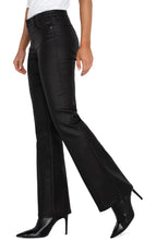 Load image into Gallery viewer, Our Lucy bootcut jeans offer a fusion of sleek style and classic comfort with a bold twist in coated black denim. The mid-rise waist ensures a snug and flattering fit, while the bootcut design lengthens the legs, creating a polished and streamlined appearance. Step into these jeans with confidence and let your distinctive fashion sense shine.