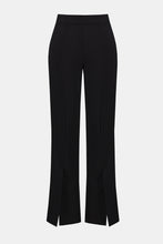 Load image into Gallery viewer, Black lux pants with front slits against a white background.