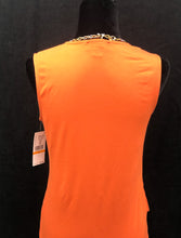 Load image into Gallery viewer, This wrinkle-free top effortlessly takes you from day to night with its carefully positioned side drape detail that sculpts and flatters your body shape. Made with a blend of rayon and spandex, this top not only feels soft against your skin, but also provides a stretch that enhances your silhouette. The brilliant solid orange color coordinates perfectly with a number of trousers, skirts and shorts and looks fabulous with denim.