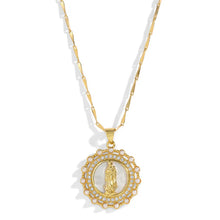 Load image into Gallery viewer, Gold necklace with a round pendant with pearls and crystals surrounding a white pearl shell with a gold Virgin Mary icon against a white background.