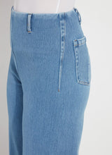 Load image into Gallery viewer, The Lyssé Margo Hi Waist Wide Crop Denim is a stylish and flattering wide-leg jean designed for comfort and elegance. Featuring a flowy palazzo shape, this denim pant offers an elongating look with a concealed patented waistband, belt loops, wide band inserts near the hem, side darts, and 70s-inspired patch pockets. The raw-edge hem allows for easy customization, making it simple to shorten if needed.