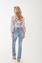 Load image into Gallery viewer, Our Olivia Medium Wash Bootcut Jean with Slits is a must-have for every wardrobe. Crafted from crosshatch denim and 34% recycled fibers, it's sure to be the most flattering pair in your collection. Plus, it features unique slits at the inner hems for an elevated look. Color- Medium Wash. Perfect stretch. Zipper and button closure. Functional back and side pockets. Fabric -60% Cotton. 34% Recycled Polyester. 4% Viscose. 2% Elastane.