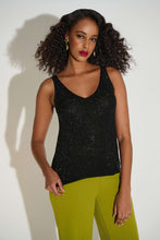 Load image into Gallery viewer, Woman wearing a black sleeveless sparkle top and green pants against a white background.