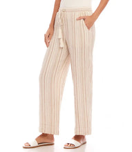 Load image into Gallery viewer, Discover a perfect blend of laid-back comfort and chic style with the Marlowe Metallic Stripe Drawstring Ankle Pants by Karen Kane. Crafted with lightweight gauze fabric, enhanced by delicate gold metallic accents, these pants are designed to elevate your everyday look. The drawstring waist ensures a customizable fit, while the ankle-length design adds a modern touch. Versatile and stylish, they're ideal for any springtime occasion.
