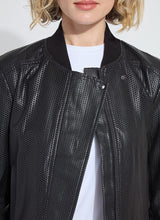 Load image into Gallery viewer, Close-up of a woman wearing a black textured leather jacket over a white tee against a white background.