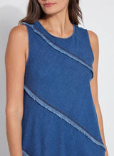Load image into Gallery viewer, Make a statement with the Mirabella Fringed Midi Denim Dress by Lysse. Designed for comfort and style, this dress features a midi-length silhouette with fringed detailing, adding a touch of effortless charm. Crafted from premium stretch denim, it offers a flattering fit while ensuring all-day ease.