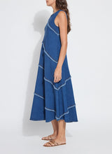 Load image into Gallery viewer, Make a statement with the Mirabella Fringed Midi Denim Dress by Lysse. Designed for comfort and style, this dress features a midi-length silhouette with fringed detailing, adding a touch of effortless charm. Crafted from premium stretch denim, it offers a flattering fit while ensuring all-day ease.