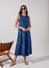 Load image into Gallery viewer, Make a statement with the Mirabella Fringed Midi Denim Dress by Lysse. Designed for comfort and style, this dress features a midi-length silhouette with fringed detailing, adding a touch of effortless charm. Crafted from premium stretch denim, it offers a flattering fit while ensuring all-day ease.