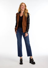 Load image into Gallery viewer, Combine the look of a cool-weather jacket with a blazer for an exceptional style. This bold statement piece includes contrasting faux leather sleeves with fabric cuffs and collar, two front flap pockets, and a traditional button closure, ideal for infusing a contemporary twist into your wardrobe.