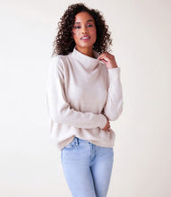 Load image into Gallery viewer, Envelop yourself in the cozy embrace of our Mock Neck Sweater. Crafted from a plush fabric, this sweater promises to deliver warmth and fashion throughout your day. Ideal for any event, its versatility and seamless style make it a fundamental piece in your collection.