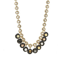 Load image into Gallery viewer, Introduce yourself to the Multi Janie Necklace, your newest must-have accessory. This 15" (with a 3" extension) necklace is crafted with antique gold plated brass base metal and accompanied by premium crystals. It's the perfect way to keep your look shining all day and night. This sparkling piece is made in Canada and is sure to turn heads with its statement-making style.