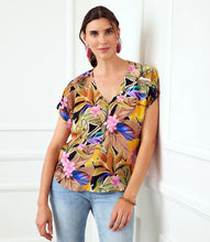 Load image into Gallery viewer, Expertly crafted from luxurious cupro fabric, this top combines tropical charm with a relaxed sophistication. The Dolman sleeves add a touch of casual elegance, creating a comfortable and laid-back fit that effortlessly complements your style. With its vibrant and breezy design, this top is perfect for any occasion.