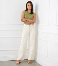 Load image into Gallery viewer, Indulge in the ultimate combination of comfort and fashion with these one-of-a-kind jeans, providing a sophisticated and modern appearance. Enhance your closet with a stylish five-pocket design and make a positive impact on the environment through the use of carefully chosen recycled materials. Color - Natural. Contrast stitching. 5 pockets. Inseam- 31 inches.