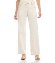 Load image into Gallery viewer, Indulge in the ultimate combination of comfort and fashion with these one-of-a-kind jeans, providing a sophisticated and modern appearance. Enhance your closet with a stylish five-pocket design and make a positive impact on the environment through the use of carefully chosen recycled materials. Color - Natural. Contrast stitching. 5 pockets. Inseam- 31 inches.