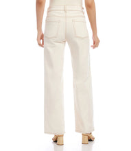 Load image into Gallery viewer, Indulge in the ultimate combination of comfort and fashion with these one-of-a-kind jeans, providing a sophisticated and modern appearance. Enhance your closet with a stylish five-pocket design and make a positive impact on the environment through the use of carefully chosen recycled materials. Color - Natural. Contrast stitching. 5 pockets. Inseam- 31 inches.