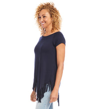 Load image into Gallery viewer, Flowing fringe trims the angled hemline of this cotton-jersey top, designed with a flattering cap sleeve silhouette. This is a perfectly fashionable top that will make a statement whenever you wear it. Color- Navy. Cap sleeve. Fringe trim at hemline. Angled hemline. Soft jersey knit. Fabric -92% Rayon. 8% Spandex.