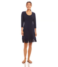 Load image into Gallery viewer, Add a touch of flair to your wardrobe with this fringe dress. Crafted from a luxurious, stretchy rayon, it offers both softness and comfort. Perfect for any event, whether you're heading out for a casual day or dressing up for an evening affair. Style it with heels, boots, sneakers, or sandals to complete your look.